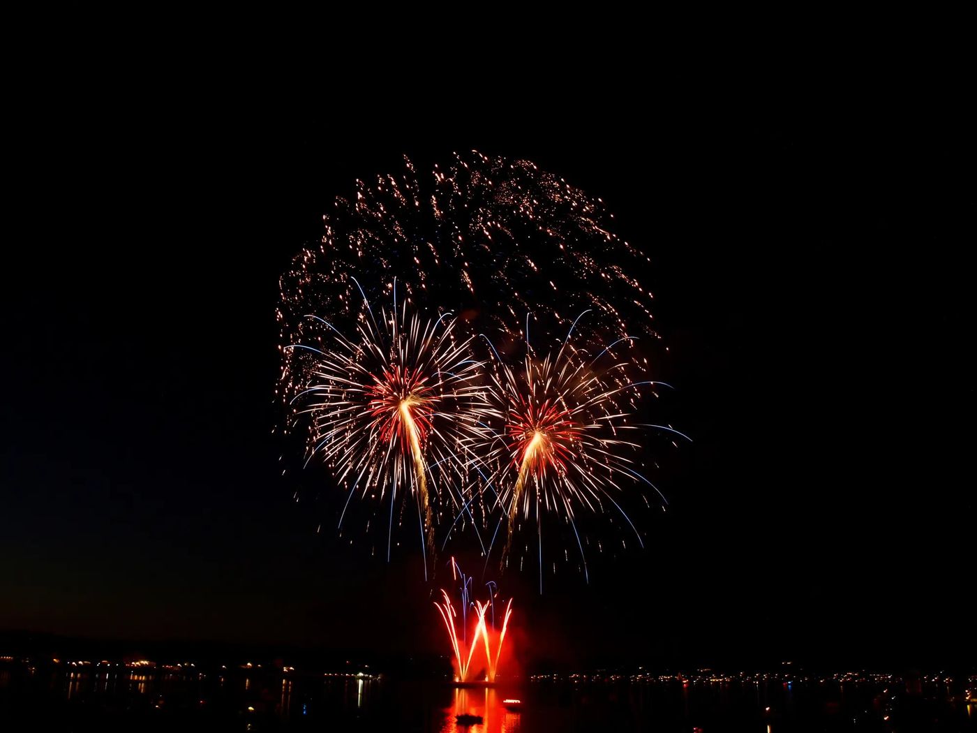 Fireworks over the water from a Miss Belmar cruise